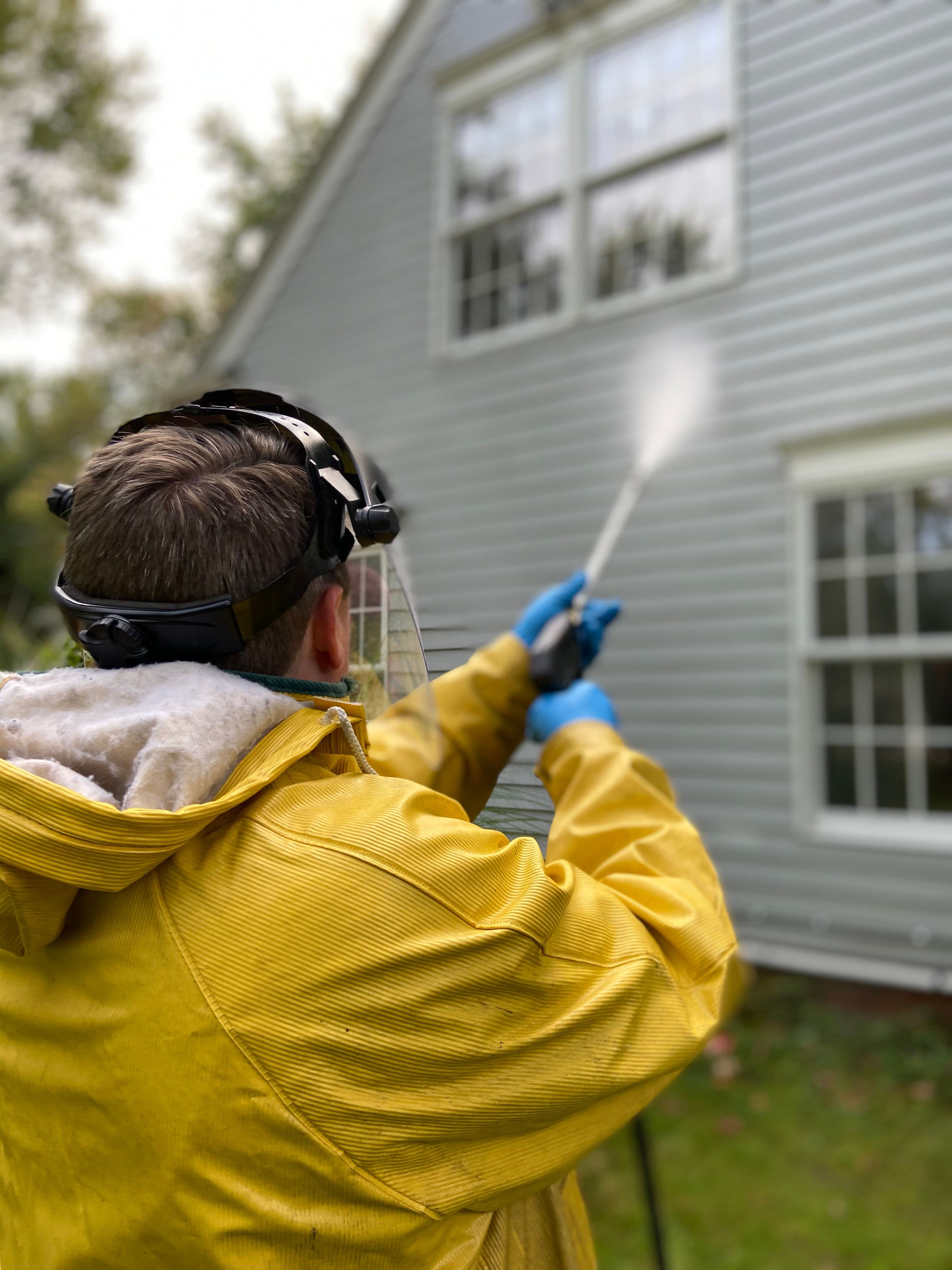 Professional exterior pressure washing in action